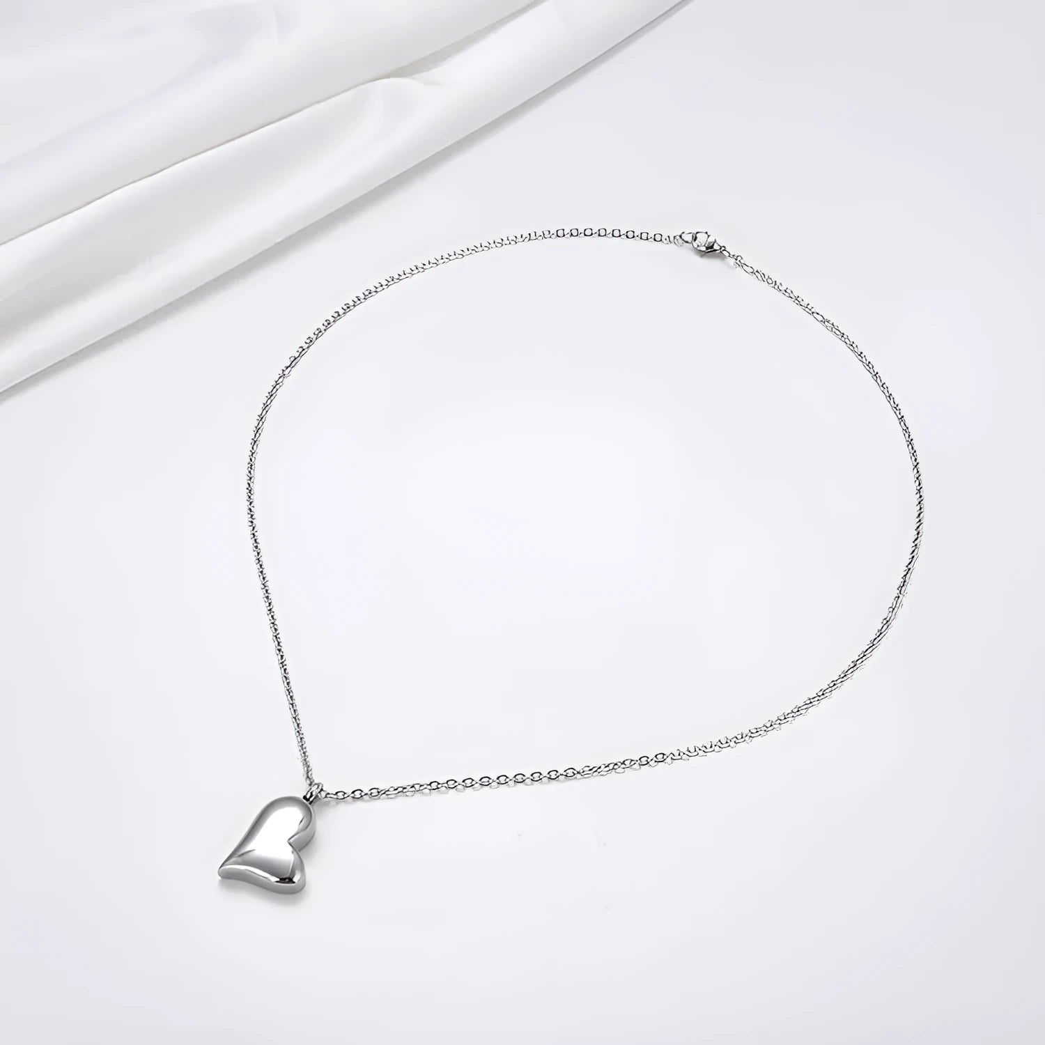 Silver stainless steel curved peach heart pendant necklace with love pattern on adjustable chain