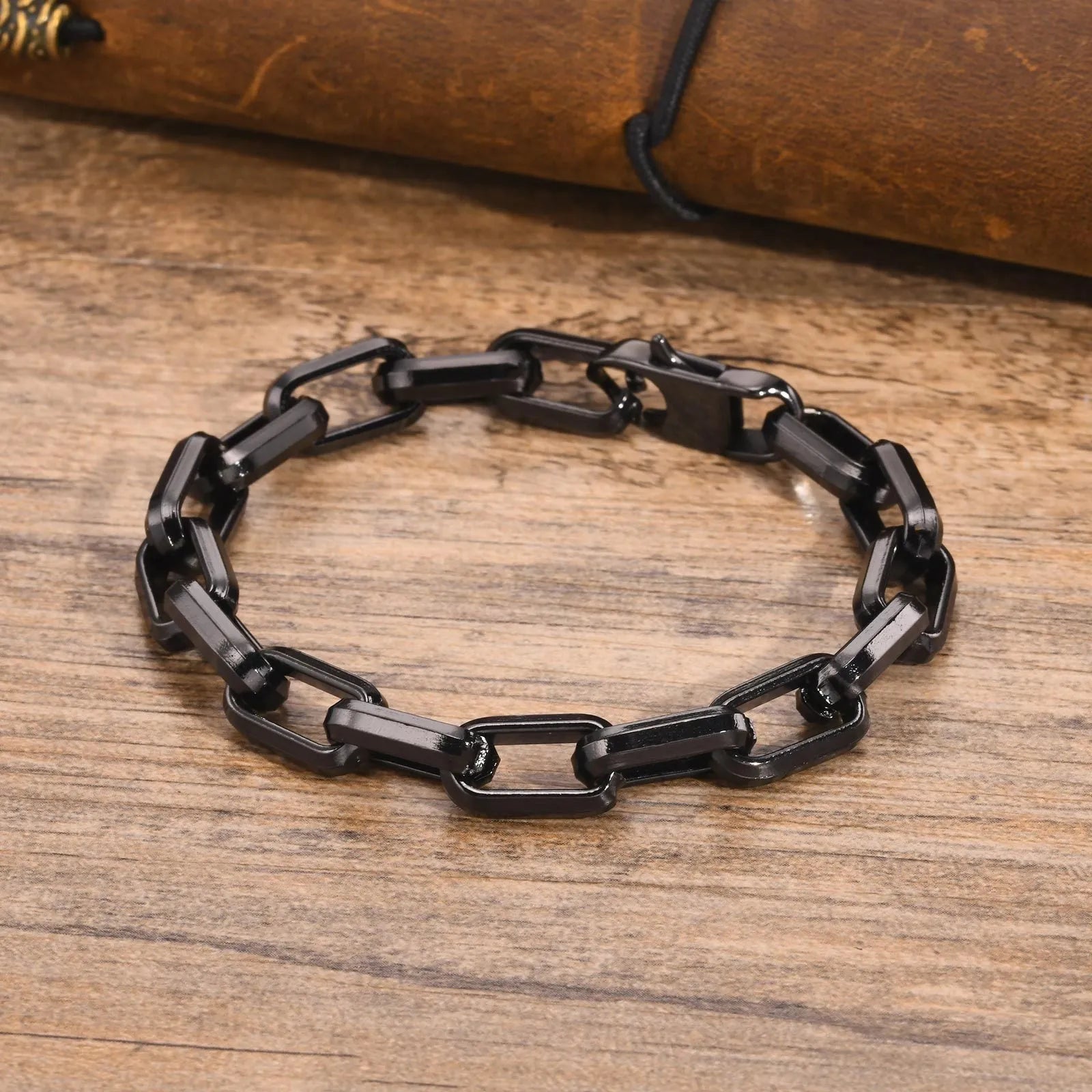Men's titanium steel square chain bracelet in electroplated black finish showing geometric link design