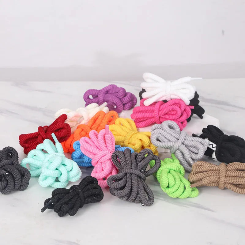 Oval hollow-core adapter rope in multiple colours and lengths for trainers and clothing.