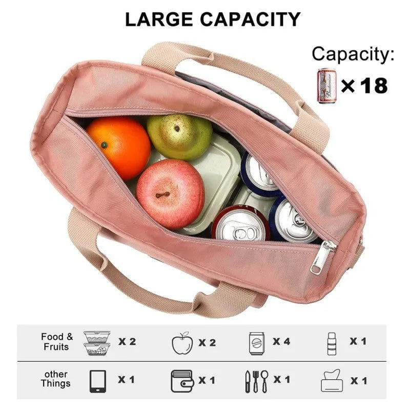 A portable cube-shaped picnic bag with a removable shoulder strap and a side pocket, shown in pink colour.