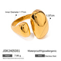 Women's geometric open ring in stainless steel with electroplated finish showing exaggerated angular design