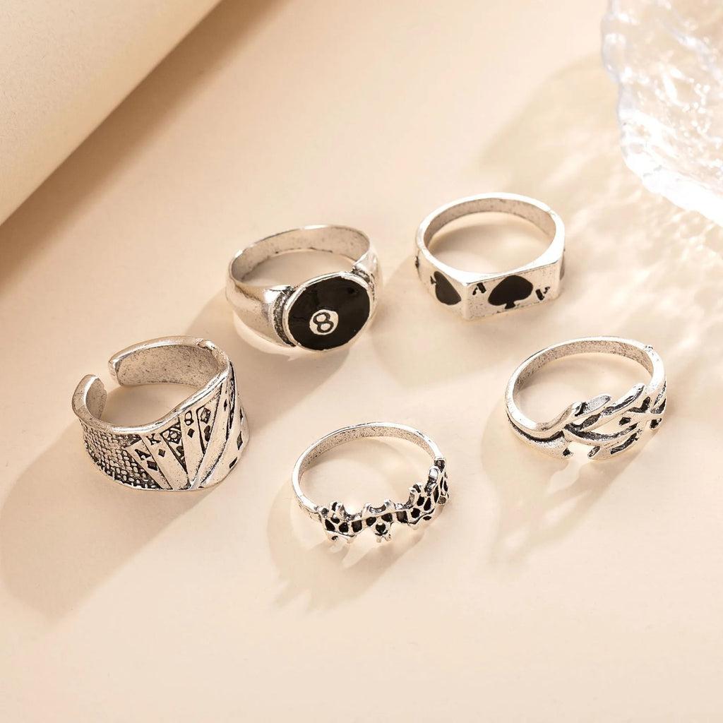 Black alloy poker ring with spade design and adjustable band
