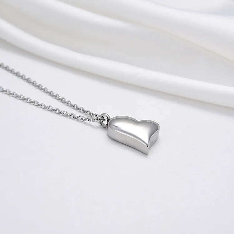 Silver stainless steel curved peach heart pendant necklace with love pattern on adjustable chain