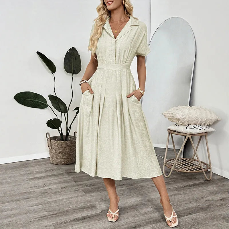 Light green women's twill shirt dress with lapel collar, fitted waist, and a chest pocket.