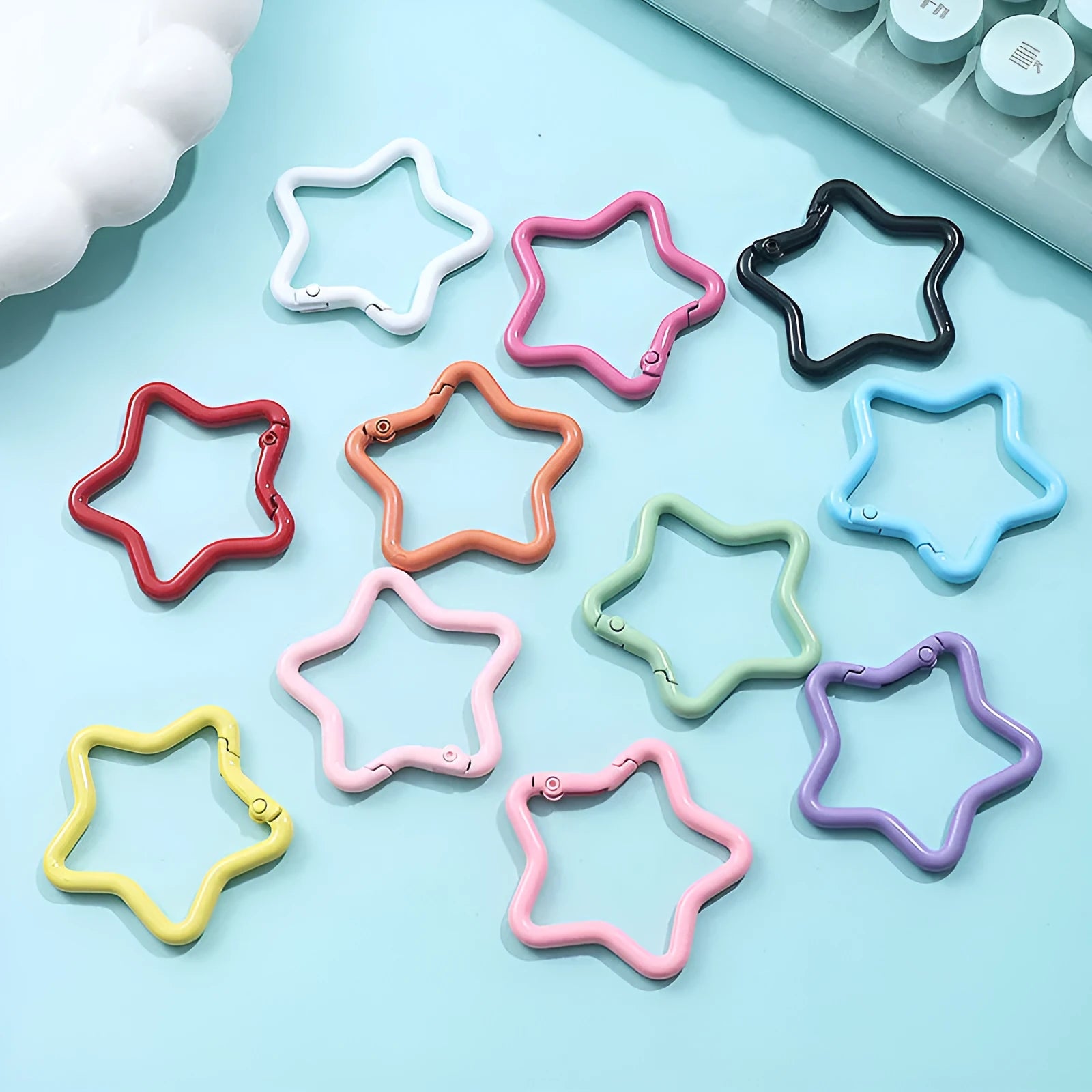 Zinc alloy five-pointed star keychain in a choice of macaron colours on a split ring.