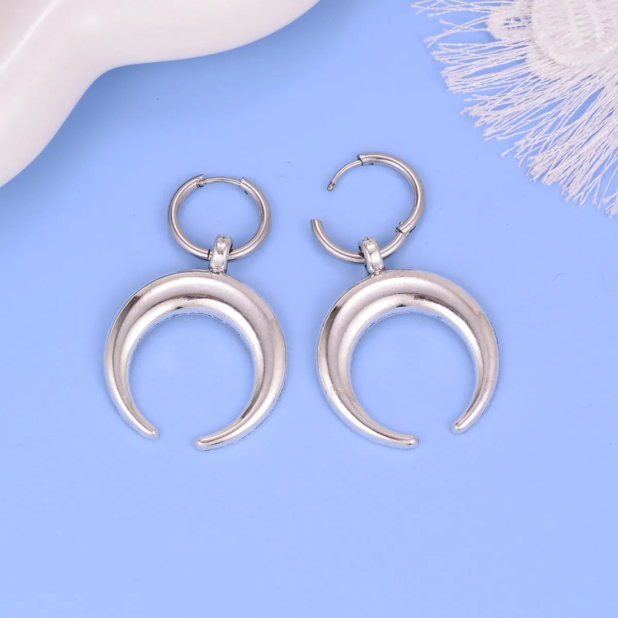 Silver gothic moon hoop ear clips with geometric design and 18K plating