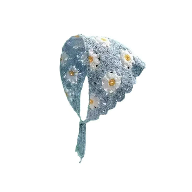 French retro cotton triangular headscarf with floral pattern and toe cap fastening.