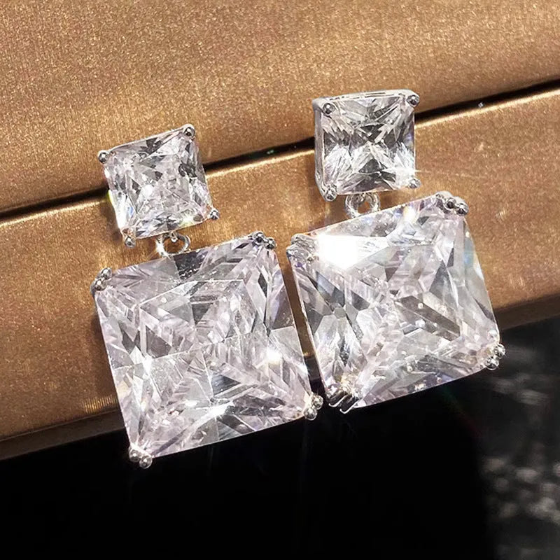 Geometric square copper earrings with quadrilateral design in white gold or golden colour finishes