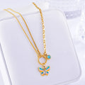 Gold titanium steel butterfly jewellery set with colourful epoxy pendant on snake bones chain