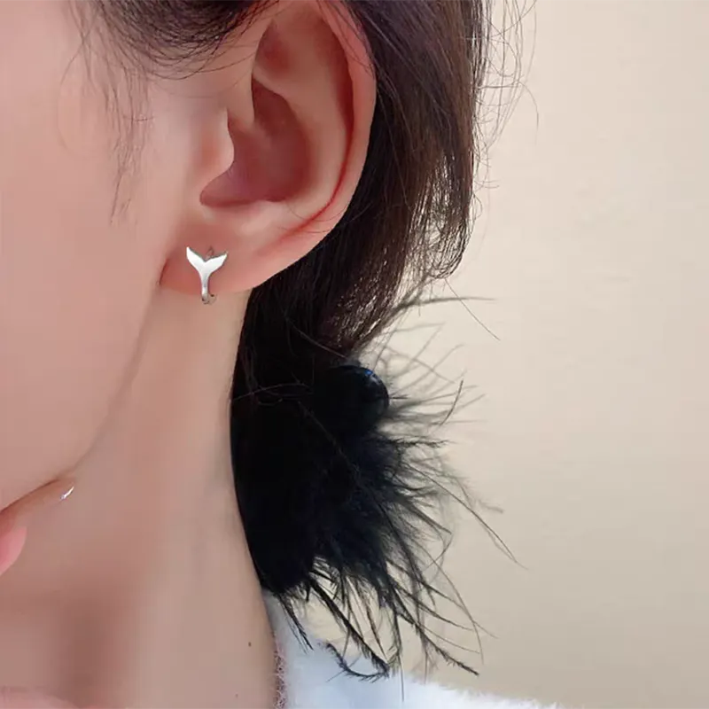 Women's copper fishtail earrings with electroplated white gold or yellow gold colour finish
