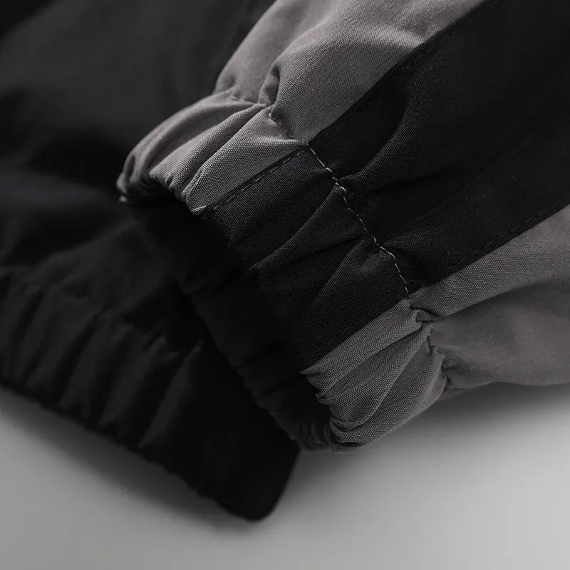 Men's black polyester casual jacket with contrast stitching detail and side seam pockets