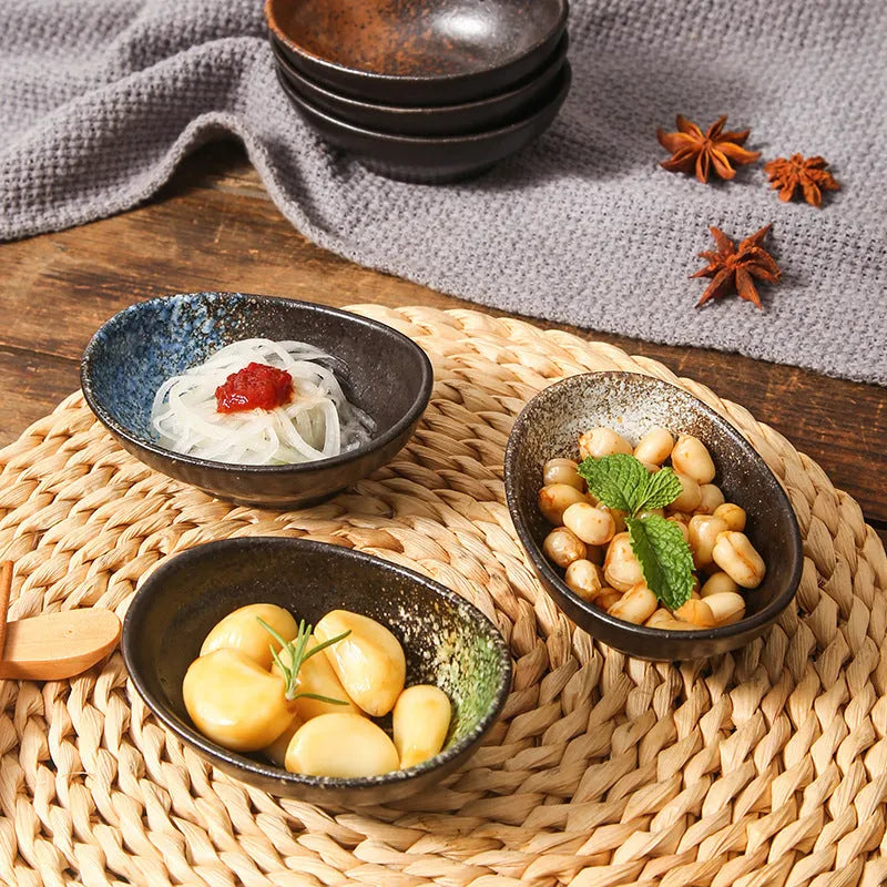 Oval Japanese ceramic sauce dipping bowl with traditional underglaze pattern