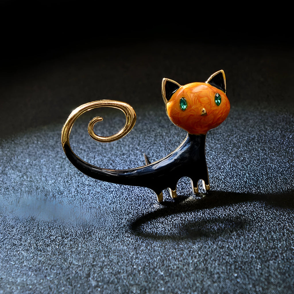Personalised painted trailing up kitten brooch in alloy metal with white or orange colour options