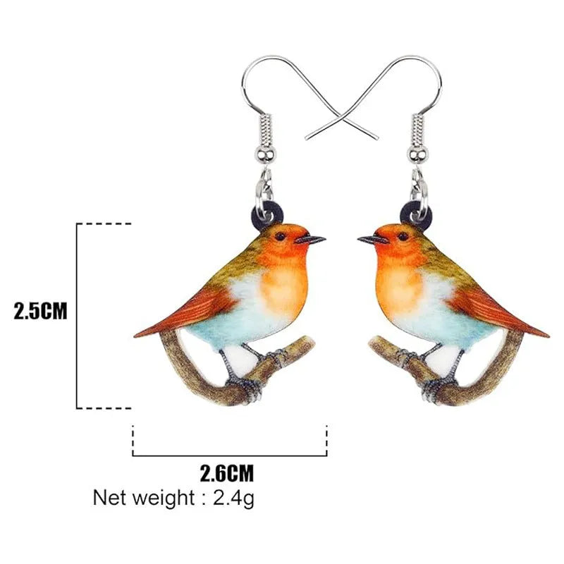 Acrylic Blue Titmouse pendant earrings with geometric and animal zodiac design including snake elements