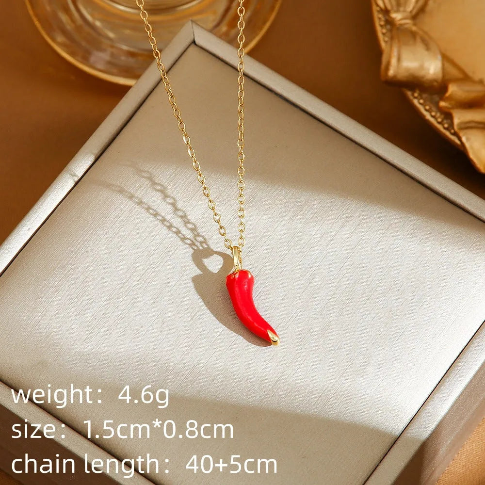 Titanium steel necklace with indie cherry, strawberry, and pepper motif pendant on an O-ring chain.
