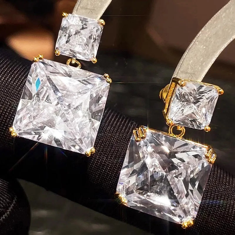 Geometric square copper earrings with quadrilateral design in white gold or golden colour finishes