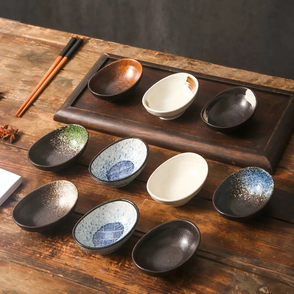 Oval Japanese ceramic sauce dipping bowl with traditional underglaze pattern