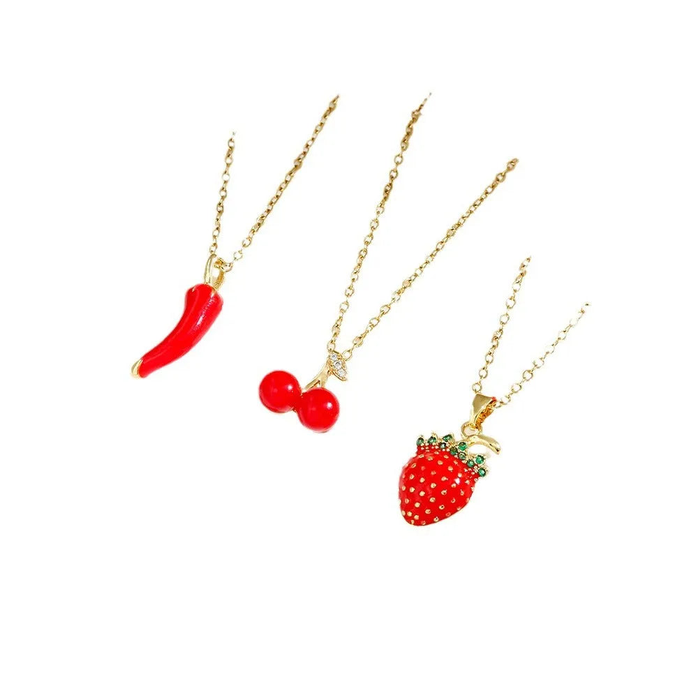 Titanium steel necklace with indie cherry, strawberry, and pepper motif pendant on an O-ring chain.