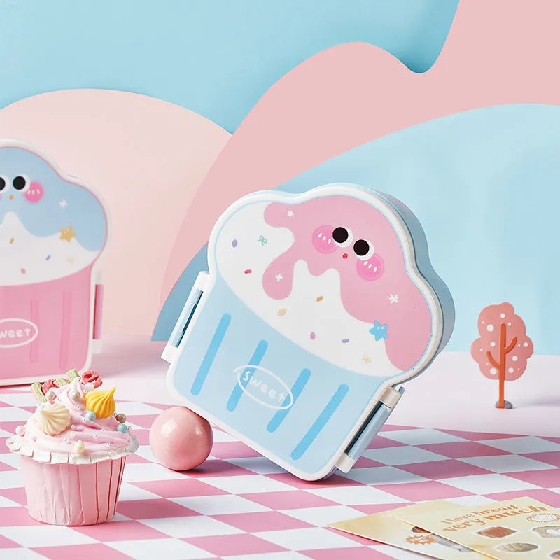 Pink and blue ice cream shaped plastic lunch boxes with bento compartments, includes spoon and fork
