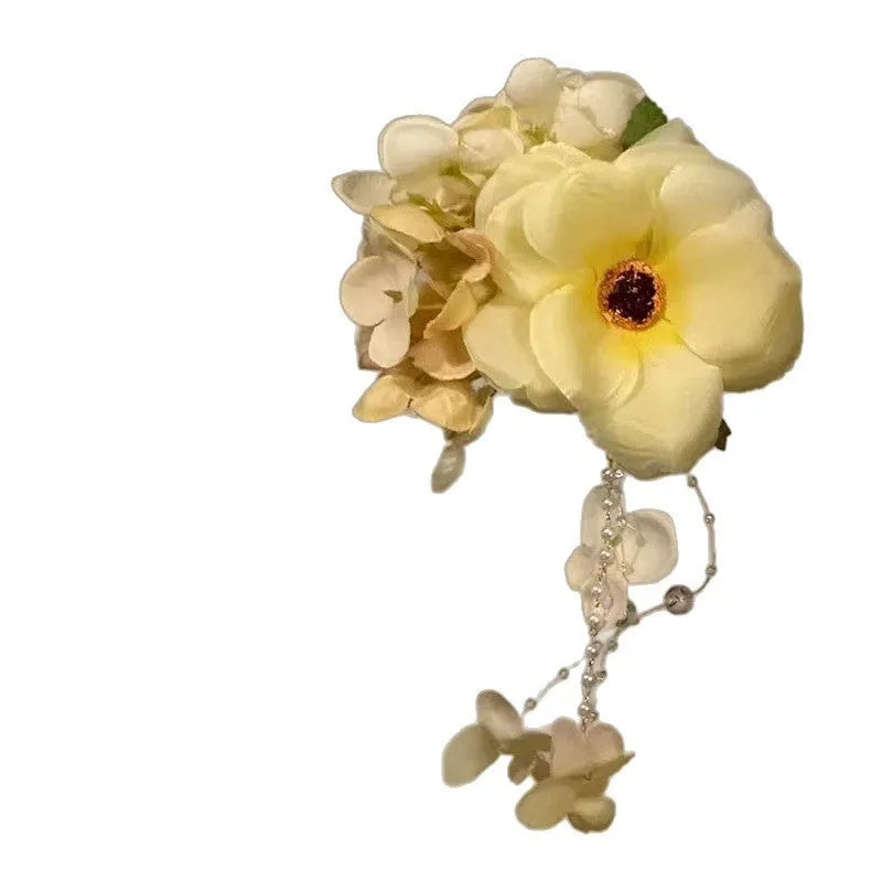 Women's floral tassel side hair clip in purple or yellow with mixed materials