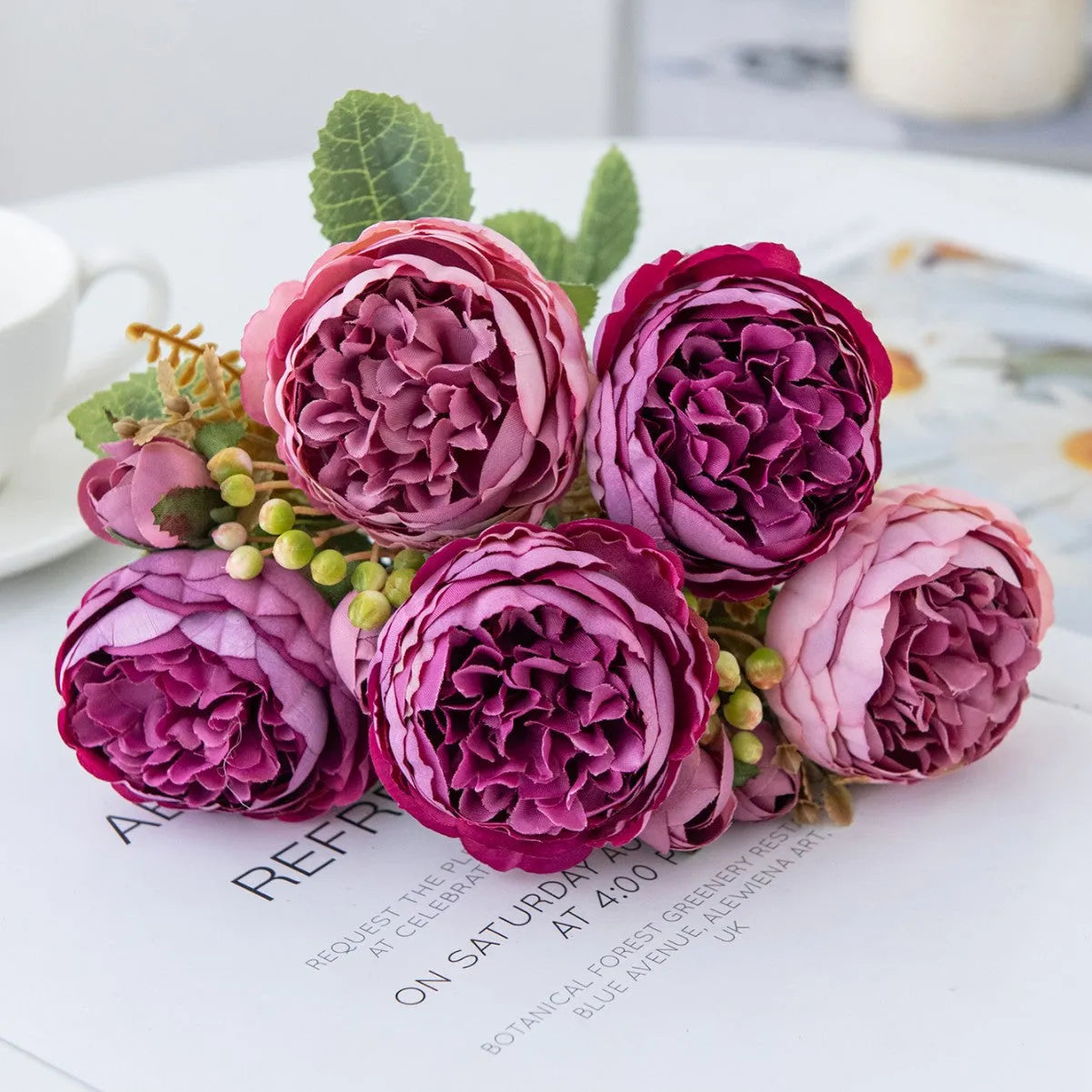 Artificial silk peony bouquet in champagne colour for home or wedding table decoration.