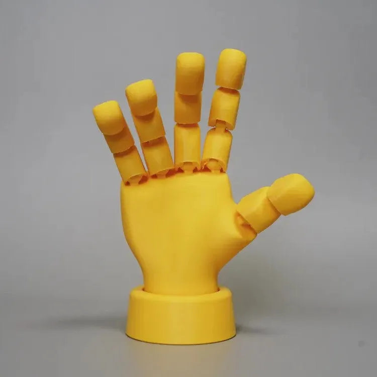 Yellow movable joint hand prop ornament with American style detailing on white background