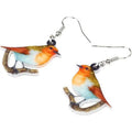 Acrylic Blue Titmouse pendant earrings with geometric and animal zodiac design including snake elements