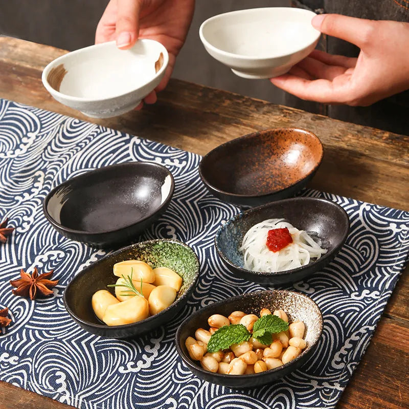 Oval Japanese ceramic sauce dipping bowl with traditional underglaze pattern