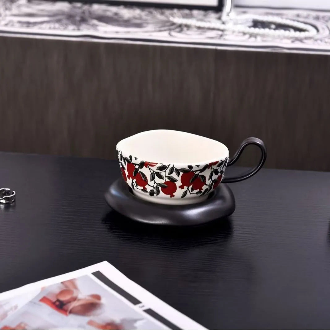 Antique style ceramic coffee cup and saucer set in black or orange medieval design, 210ml capacity.