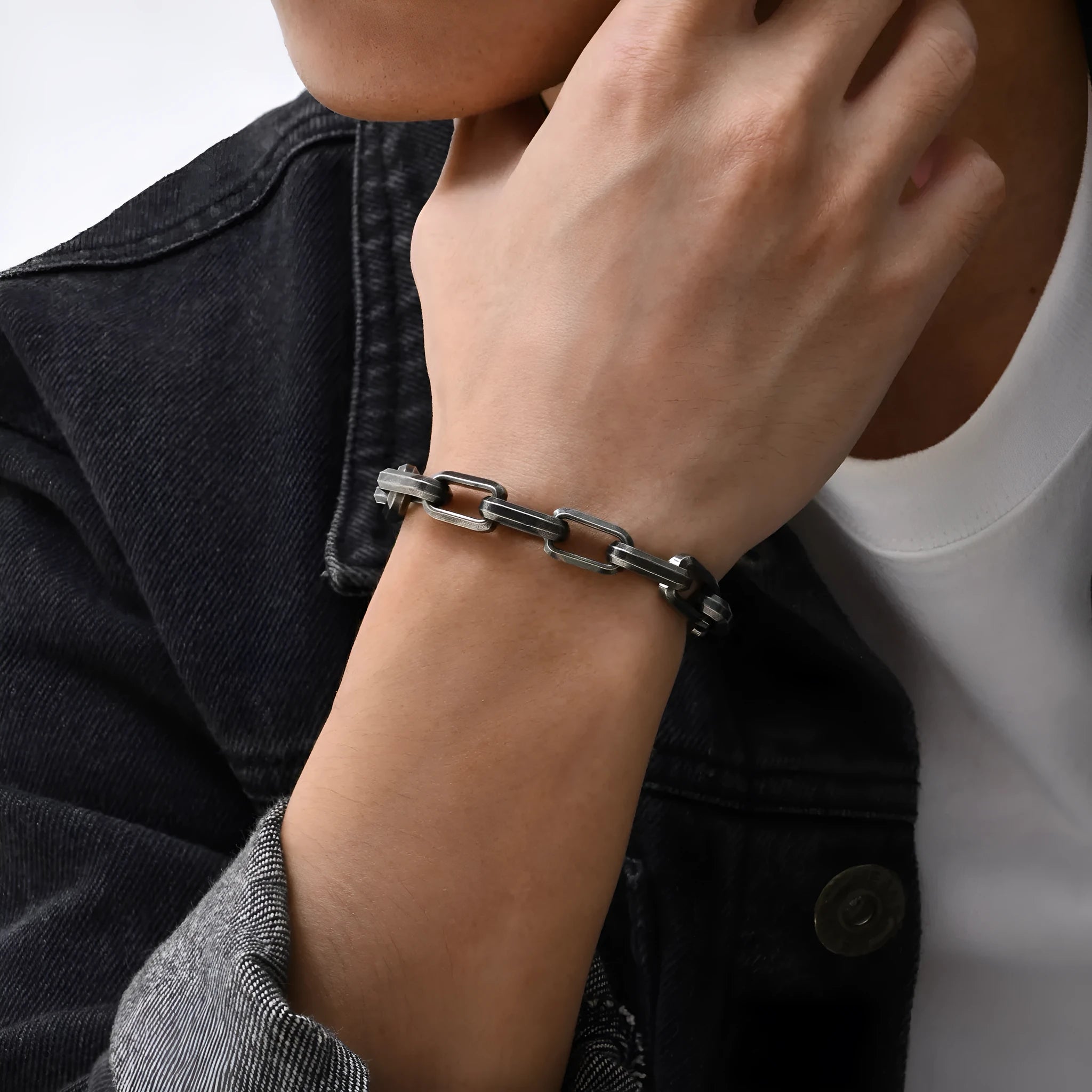 Men's titanium steel square chain bracelet in electroplated black finish showing geometric link design