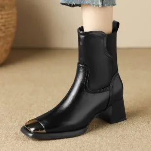 Brown women's high-heel Martin boots with a side zipper and cowhide leather upper.