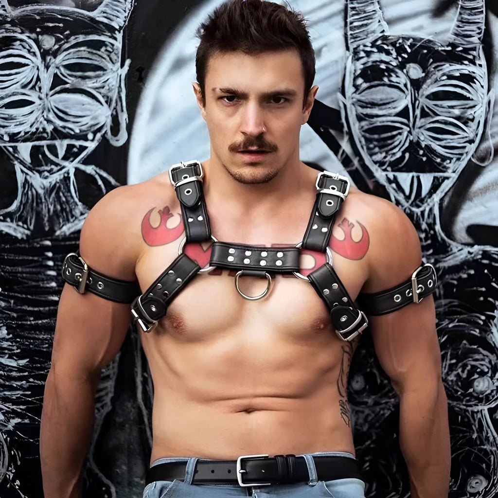Black leather chest muscle bondage strap with metal buckle adjustment for adult shoulder harness