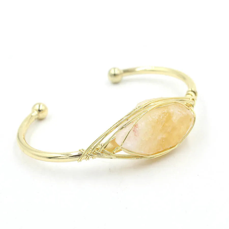 Natural raw gemstone crystal bracelet showing 8mm winding design with simple opening clasp in amethyst colour