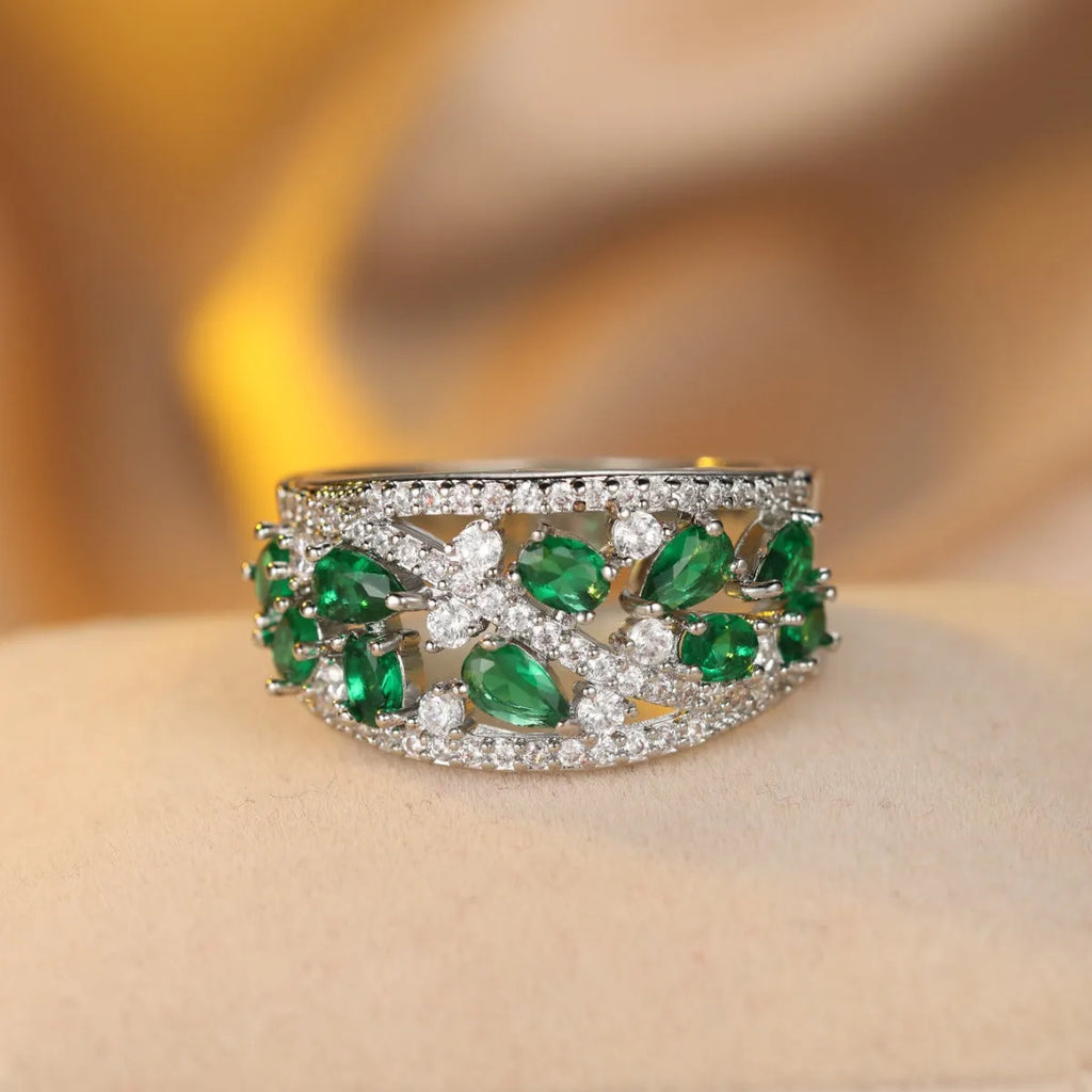 Women's round hollow copper fashion ring showing gold and platinum colour options with gemstone tone finishes