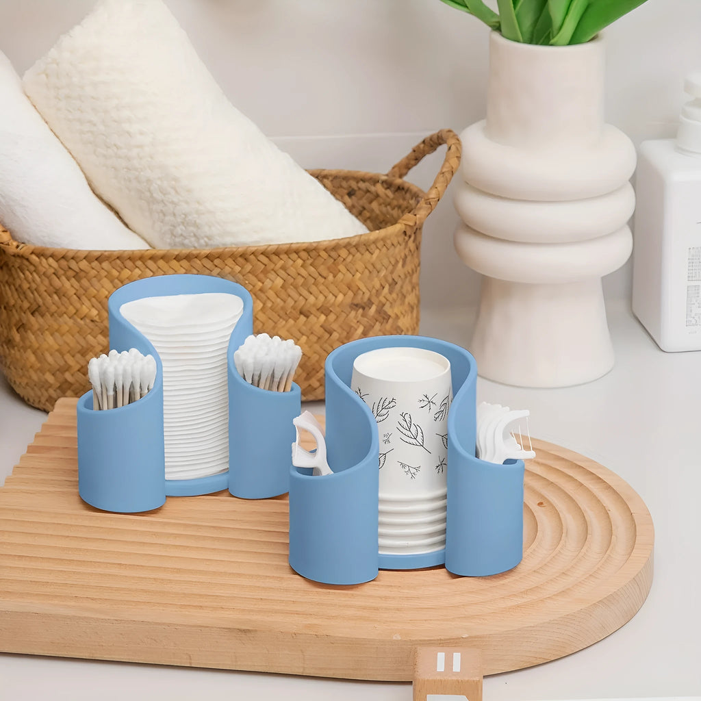 Modern solid-colour plastic cotton box for storing dental floss and cotton wool.