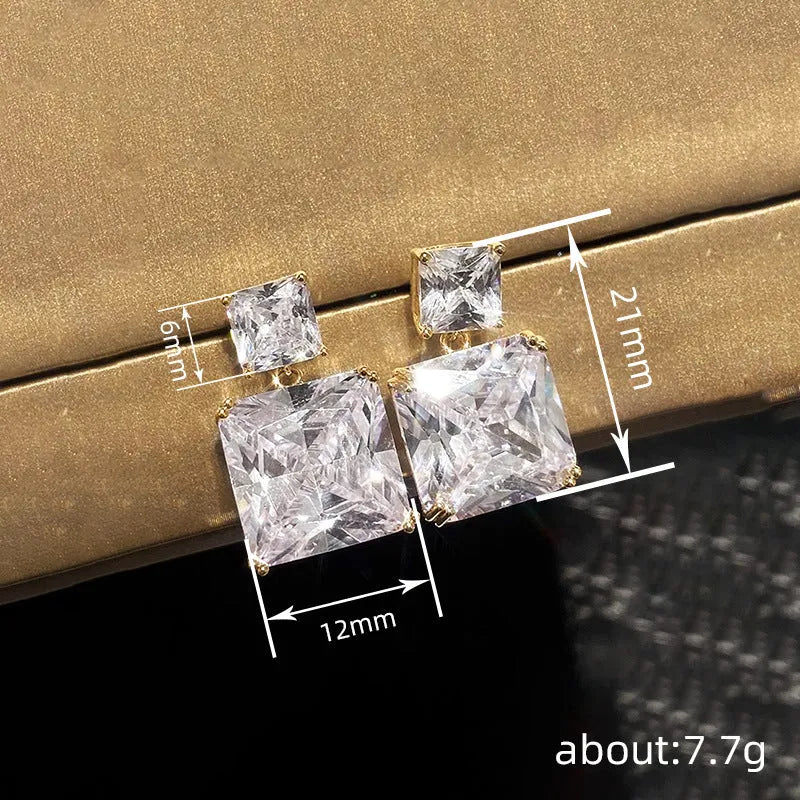 Geometric square copper earrings with quadrilateral design in white gold or golden colour finishes