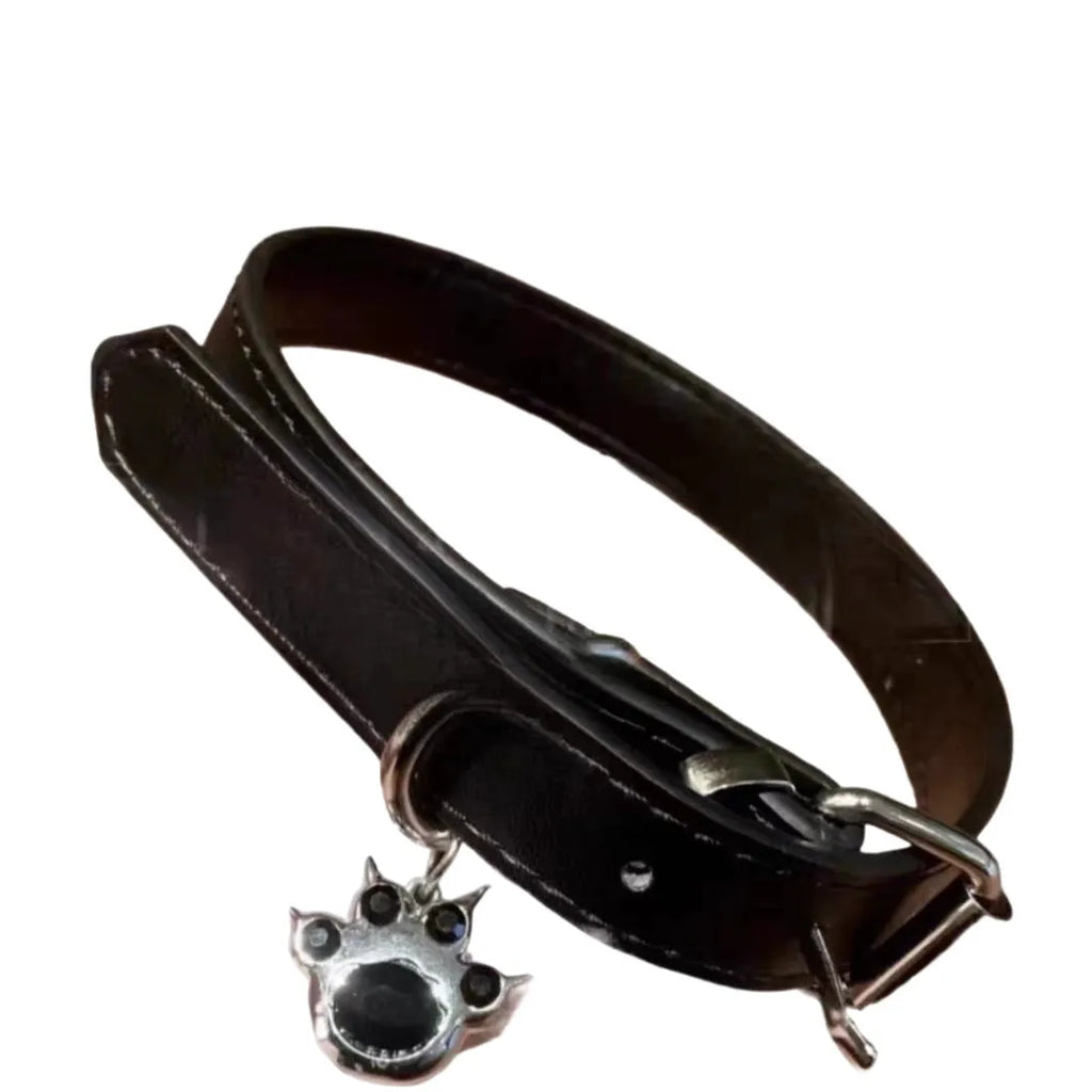 Black leather pet collar with small bell pendant for cats and small dogs
