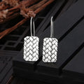 Women's silver 925 sterling silver woven diamond plaid geometric earrings showing textured pattern