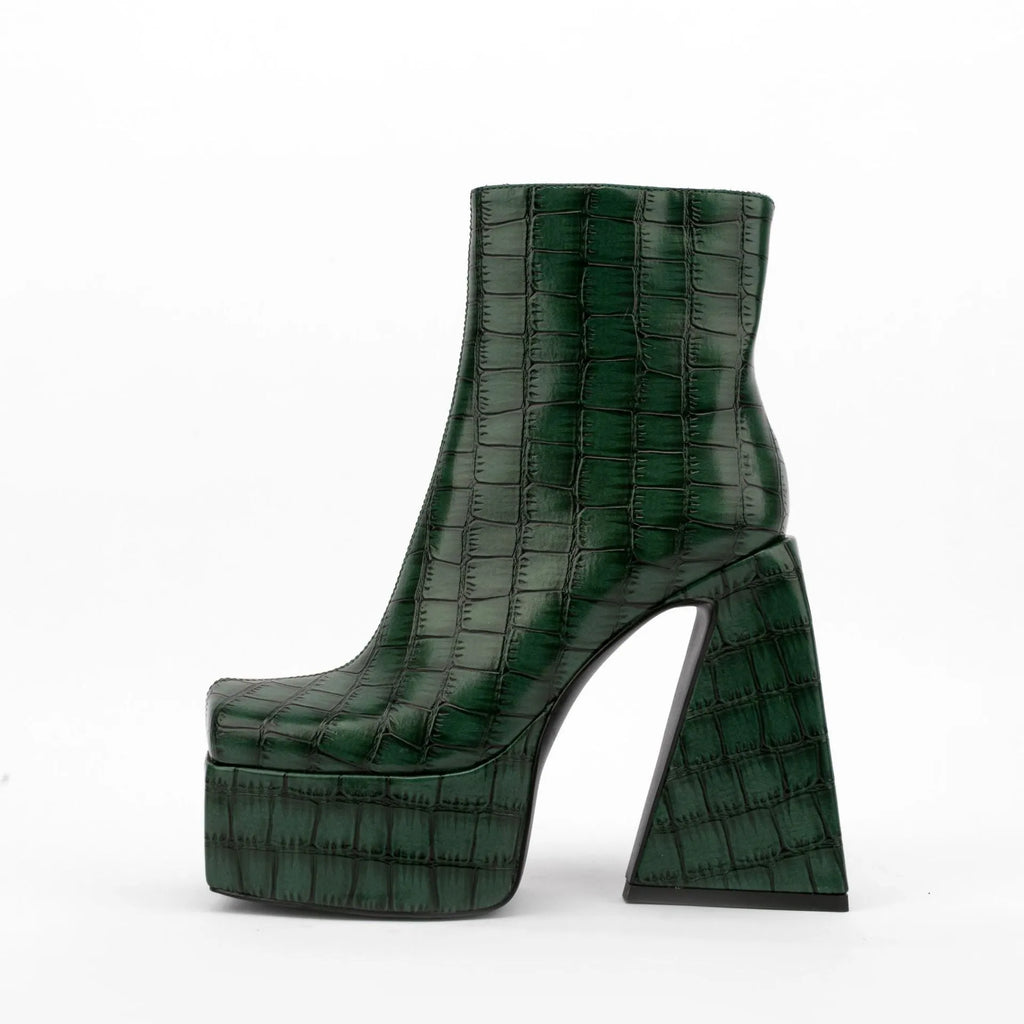 Women's artificial PU ankle boots with super high heels, shown in solid colours.