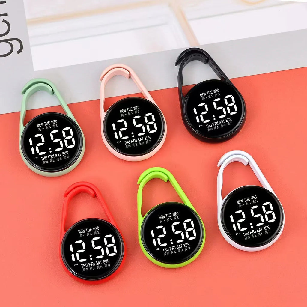 Simple luminous mini electronic LED digital watch with plastic strap in various colours.
