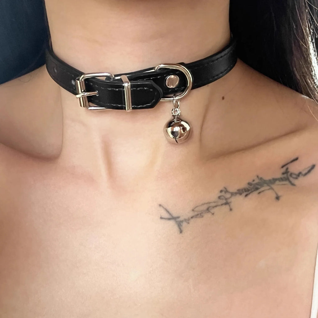Black leather pet collar with small bell pendant for cats and small dogs