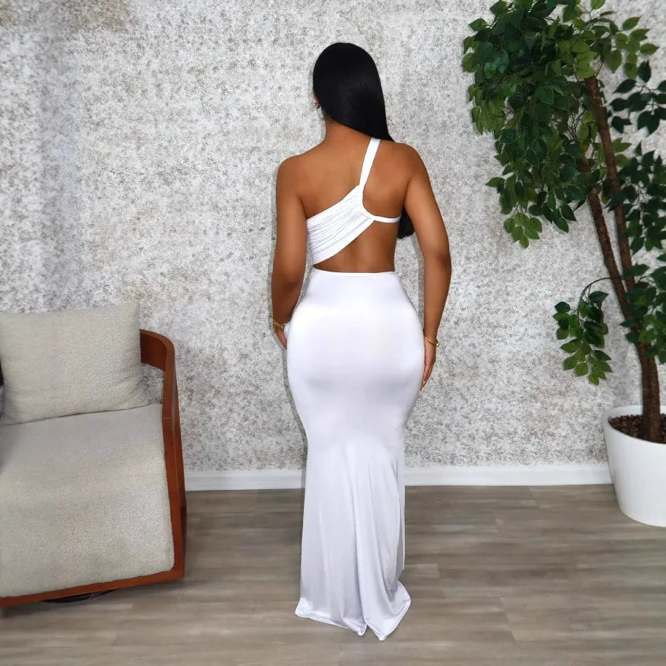 Women's solid colour one-shoulder pleated midi dress in polyester fabric on a model.