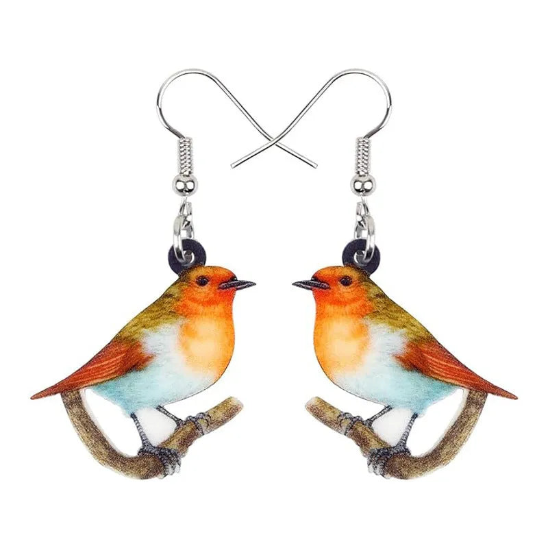 Acrylic Blue Titmouse pendant earrings with geometric and animal zodiac design including snake elements