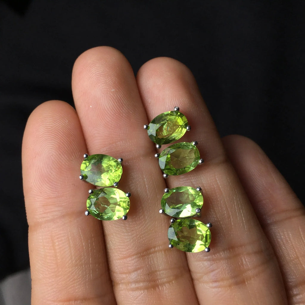 Grass green olivine stud earrings with S925 silver setting and geometric oval stone.