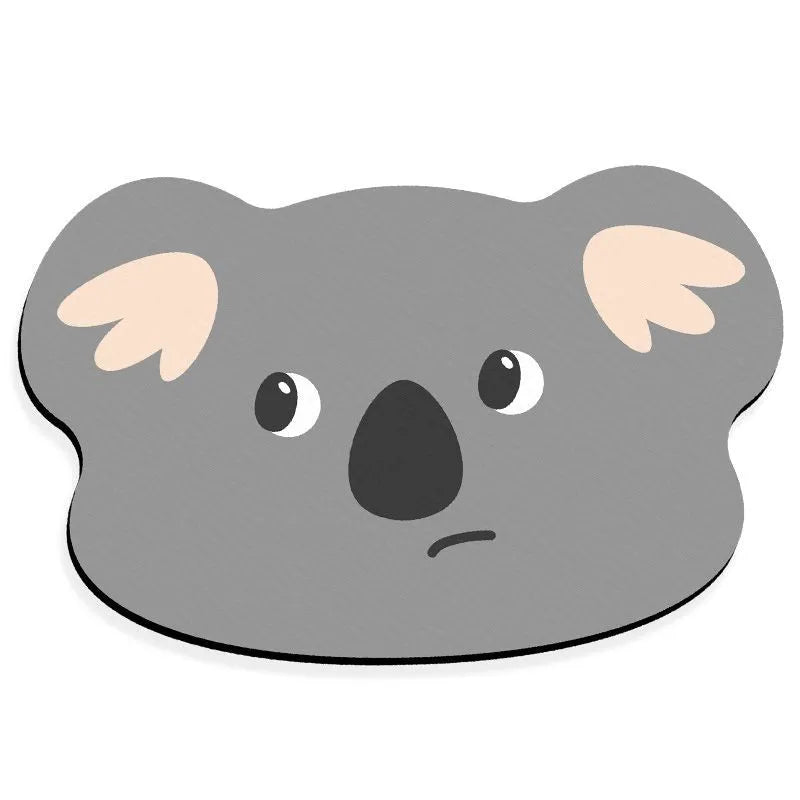 Diatomaceous earth bathroom mat with cartoon animal design on alien-shaped base