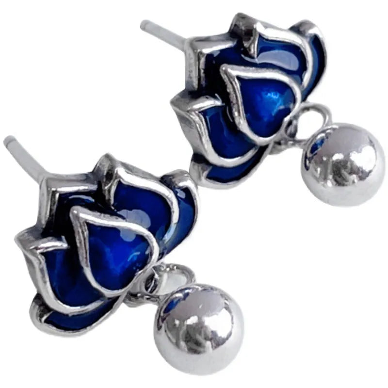 Blue lotus earrings with seedpod tassel design, silver alloy floral ear studs
