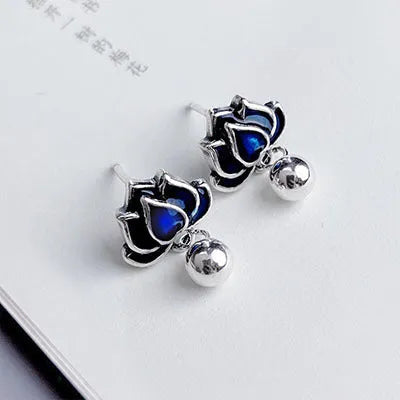 Blue lotus earrings with seedpod tassel design, silver alloy floral ear studs