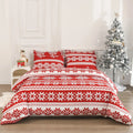 Red Winter Sleepers quilt cover and pillowcases with Christmas Love Song pattern on a bed.