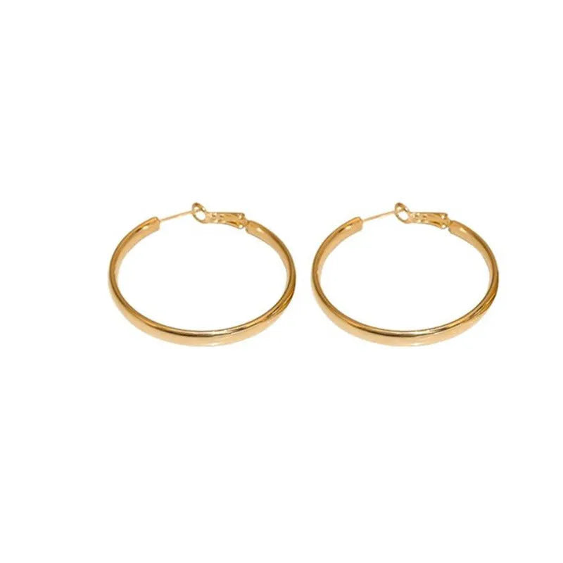 40mm diameter gold and silver metal circle hoop earrings on copper base