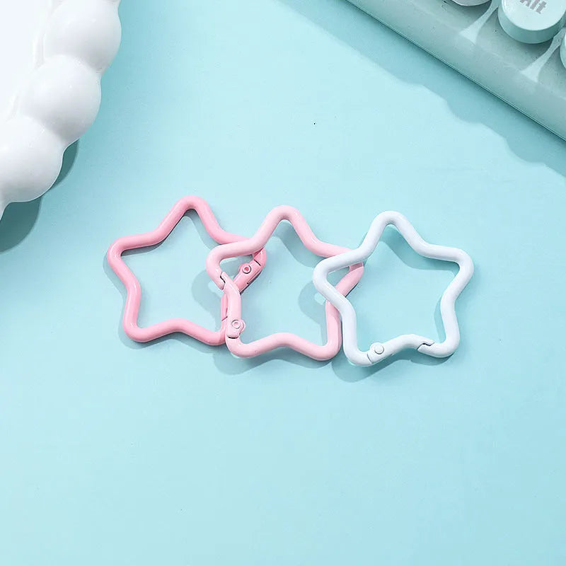 Zinc alloy five-pointed star keychain in a choice of macaron colours on a split ring.